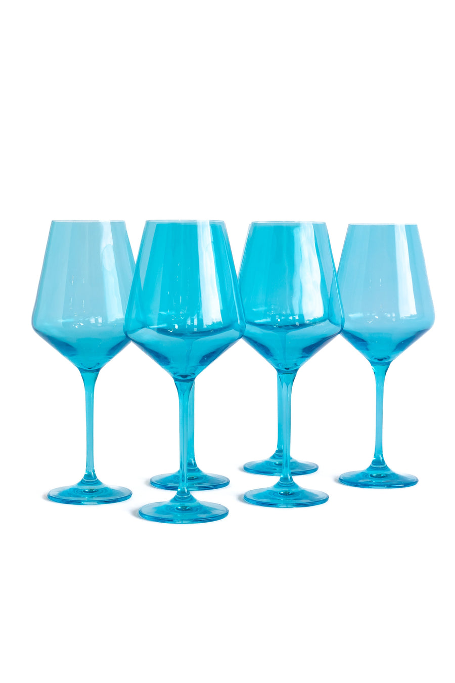 Elegant ocean blue wine glasses set on a pristine table, capturing the essence of luxury and coastal charm.