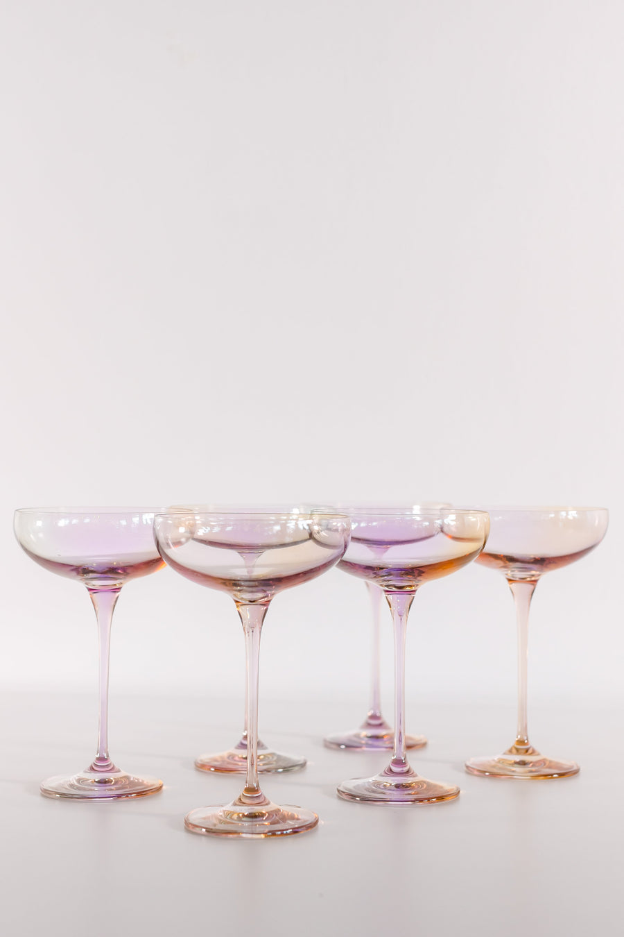 Elegant iridescent champagne bottle reflecting soft light, perfect for sophisticated event decor and celebrations.
