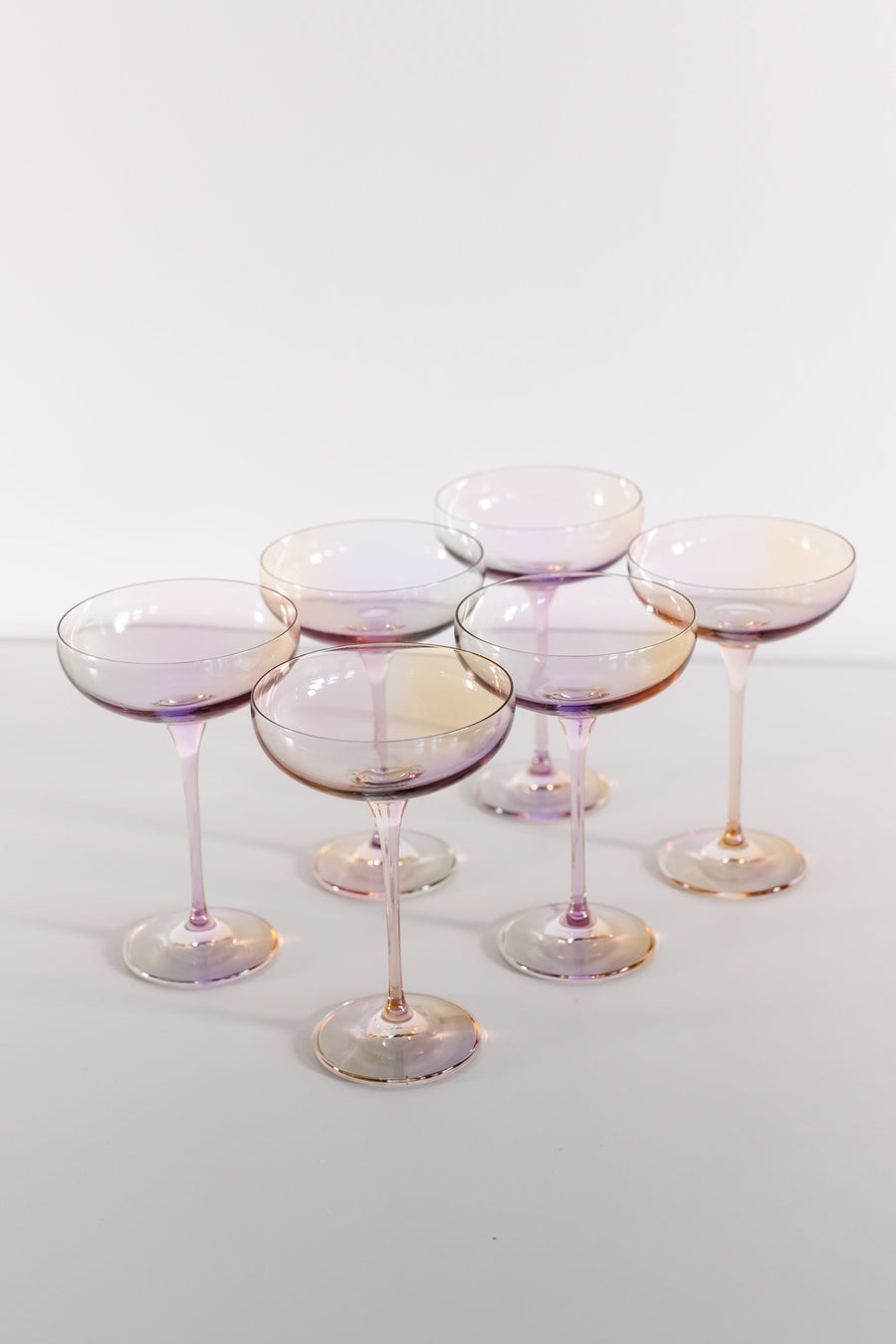 Elegant iridescent champagne bottle reflecting soft light, perfect for sophisticated event decor and celebrations.