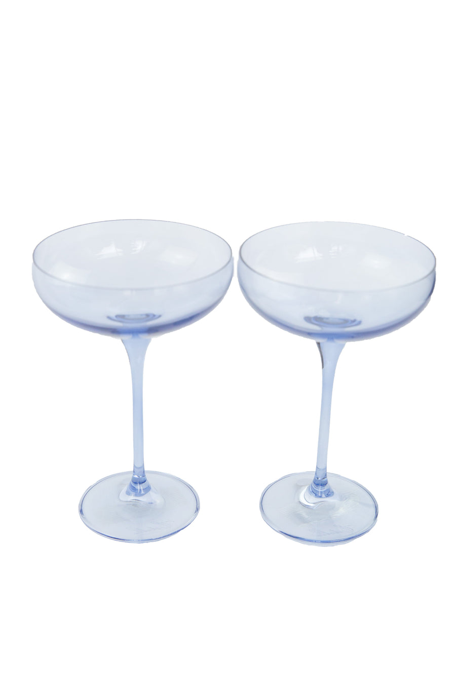 Elegant cobalt blue champagne coupes set for sophisticated celebrations and upscale events