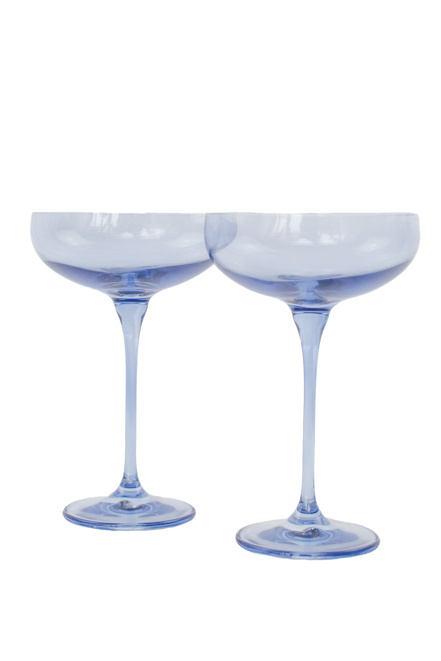 Elegant cobalt blue champagne coupes set for sophisticated celebrations and upscale events