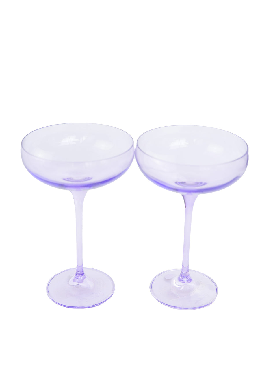 Lavender-themed setting with elegant champagne coupes, perfect for sophisticated celebrations and décor.