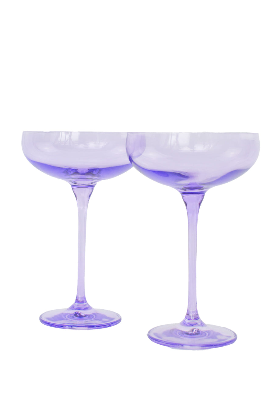 Lavender-themed setting with elegant champagne coupes, perfect for sophisticated celebrations and décor.