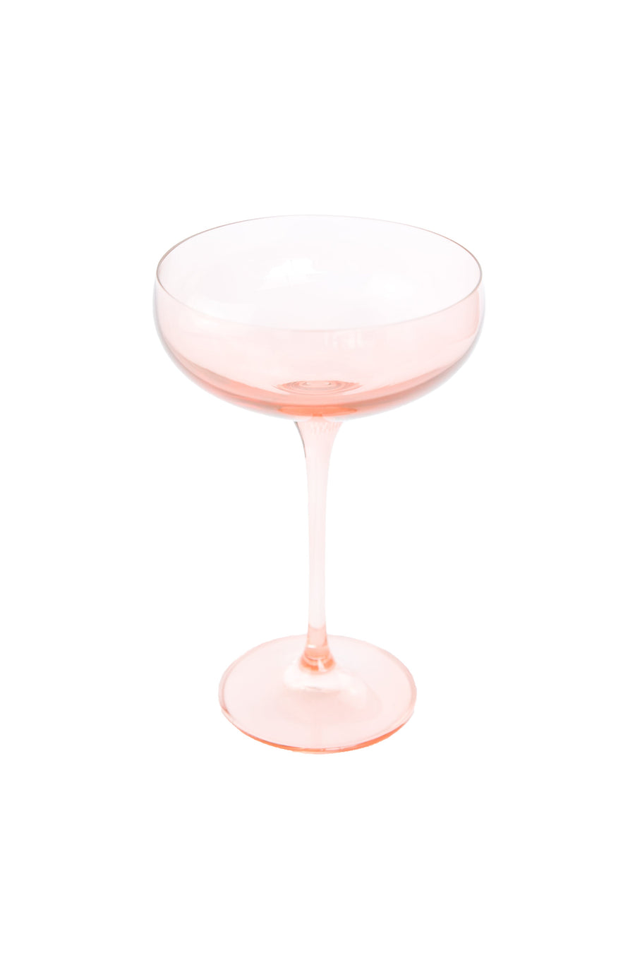 Elegant blush pink champagne coupes perfect for sophisticated celebrations and stylish toasts.