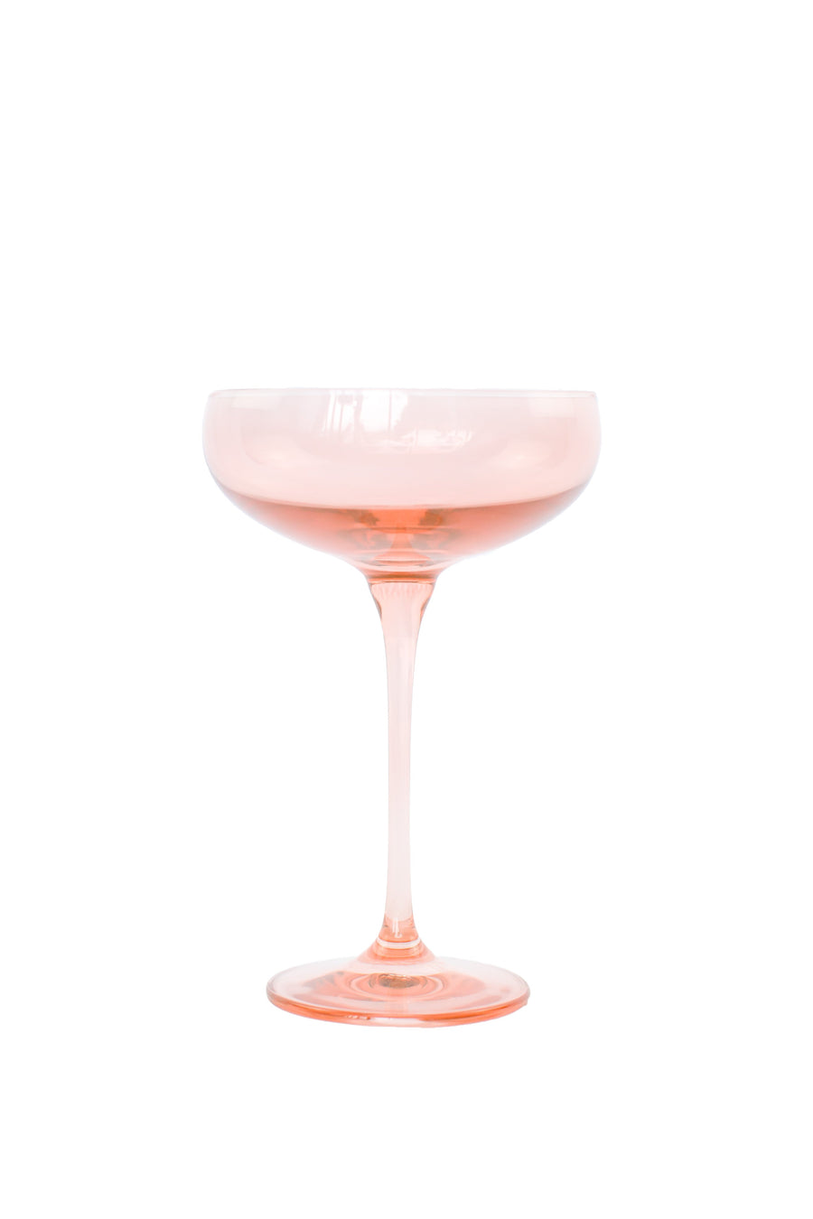 Elegant blush pink champagne coupes perfect for sophisticated celebrations and stylish toasts.