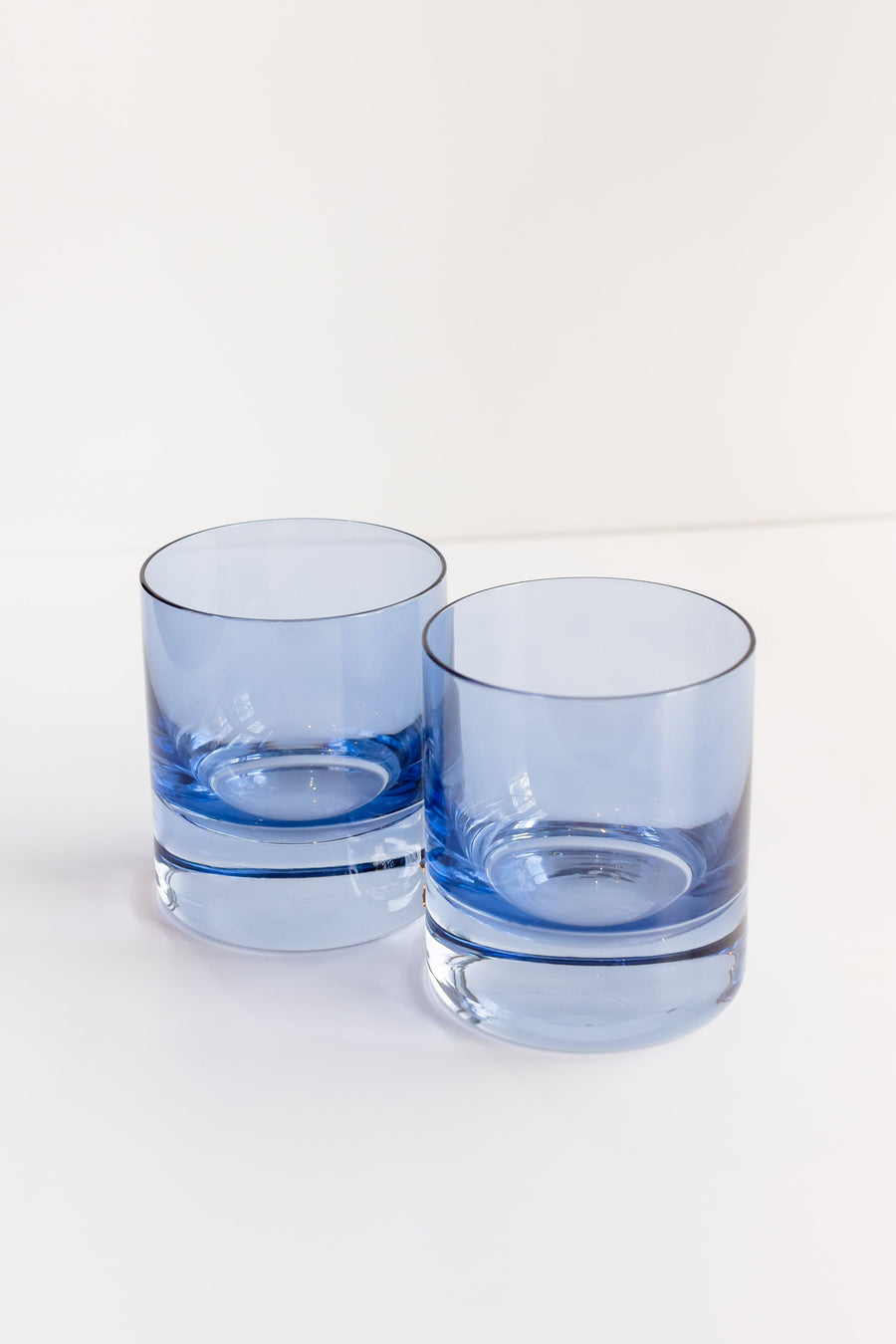 Cobalt blue rocks glass showcasing elegant design and vibrant color, perfect for stylish beverage presentation