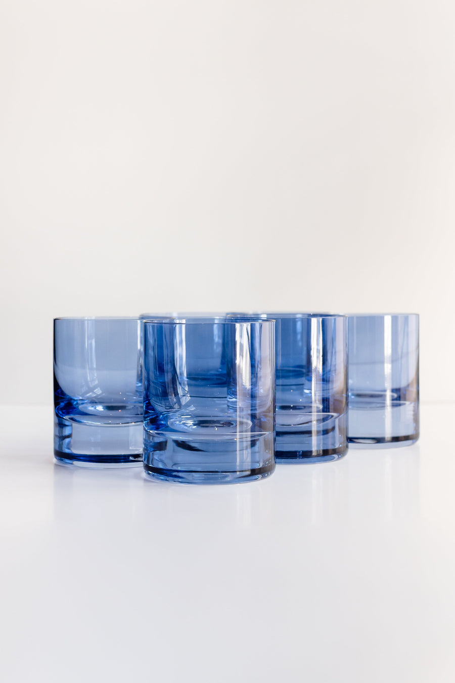 Cobalt blue rocks glasses set showcasing elegant design and vibrant color, perfect for stylish drinkware collections.