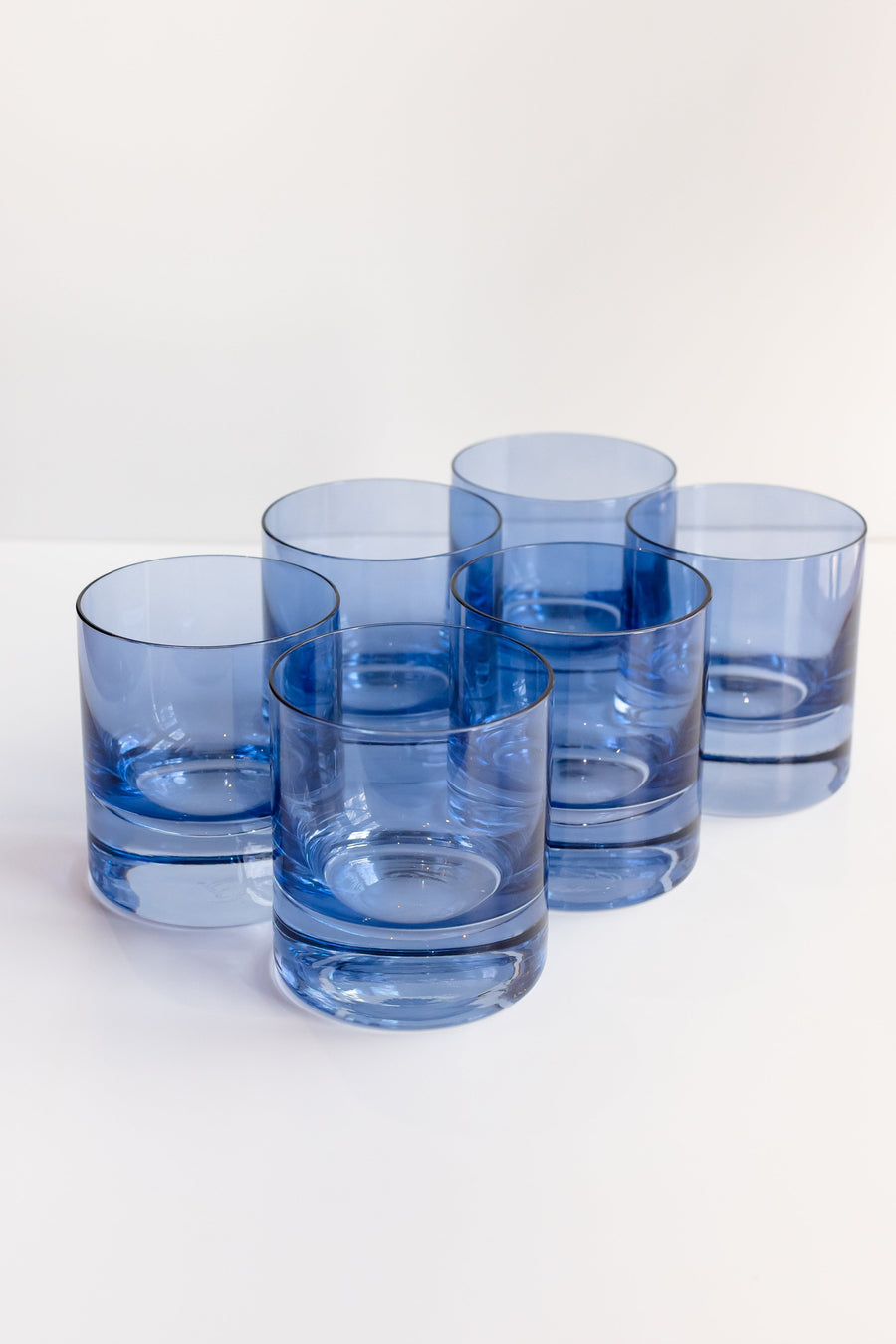 Cobalt blue rocks glasses set showcasing elegant design and vibrant color, perfect for stylish drinkware collections.