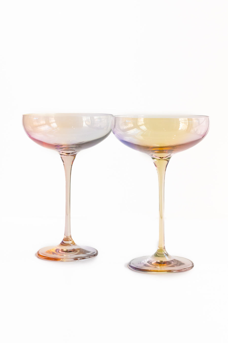 Elegant iridescent champagne glass reflecting soft light, perfect for sophisticated celebrations and stylish events.