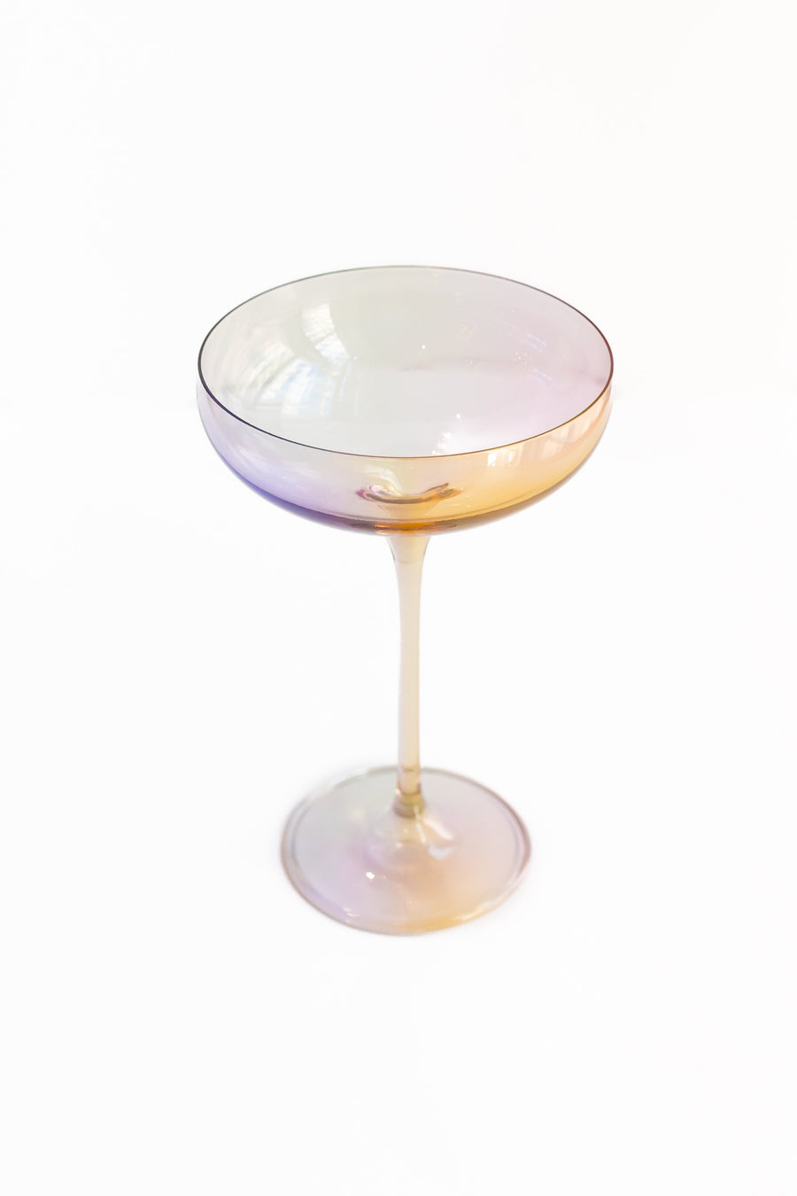 Elegant iridescent champagne glass reflecting soft light, perfect for sophisticated celebrations and stylish events.