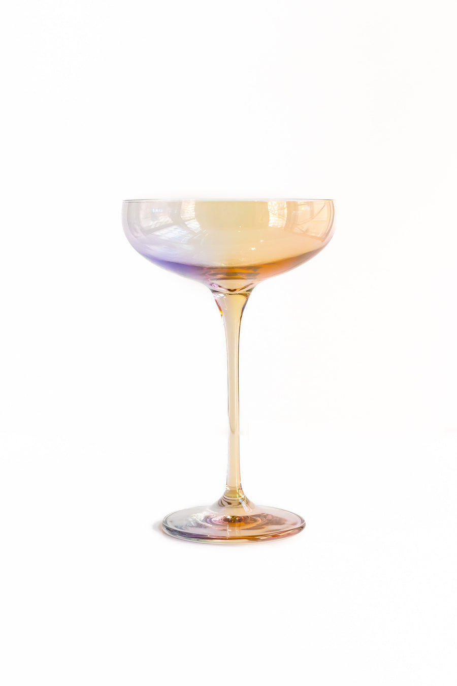 Elegant iridescent champagne glass reflecting soft light, perfect for sophisticated celebrations and stylish events.