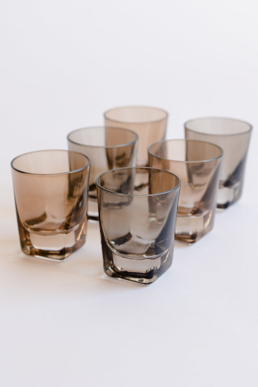 Colorful vibrant shot glasses arranged elegantly for an upscale dining experience.