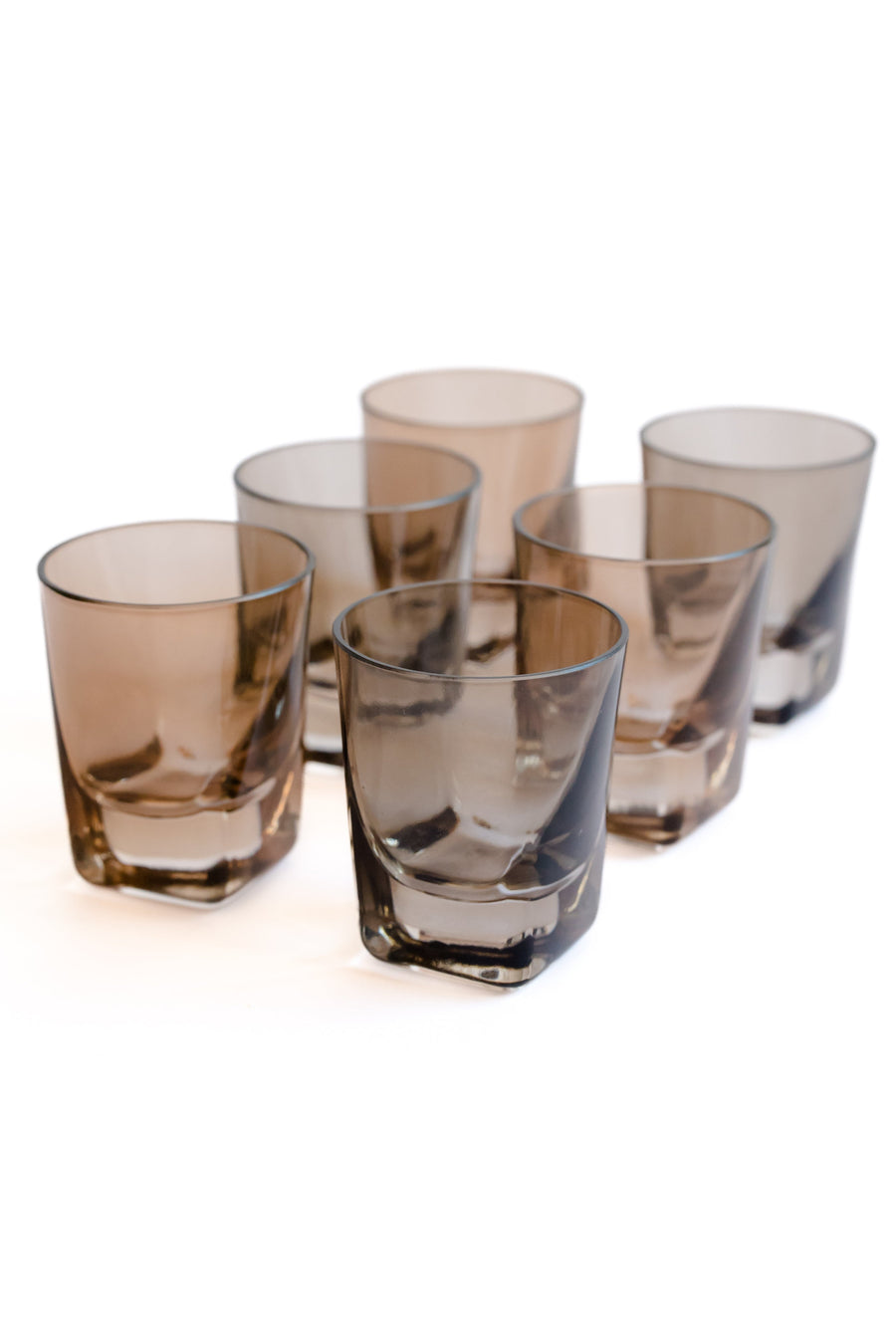 Colorful vibrant shot glasses arranged elegantly for an upscale dining experience.