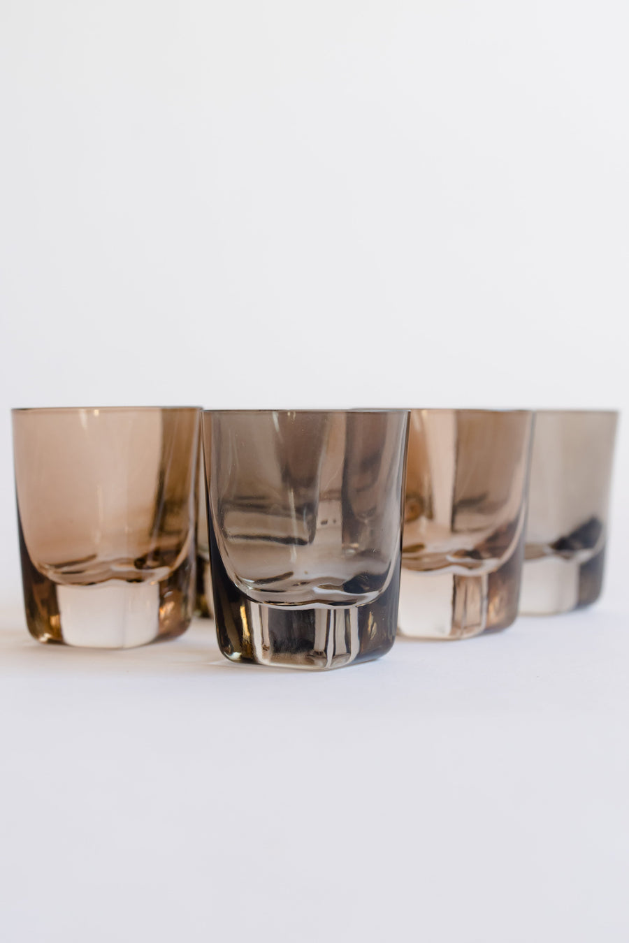 Colorful vibrant shot glasses arranged elegantly for an upscale dining experience.