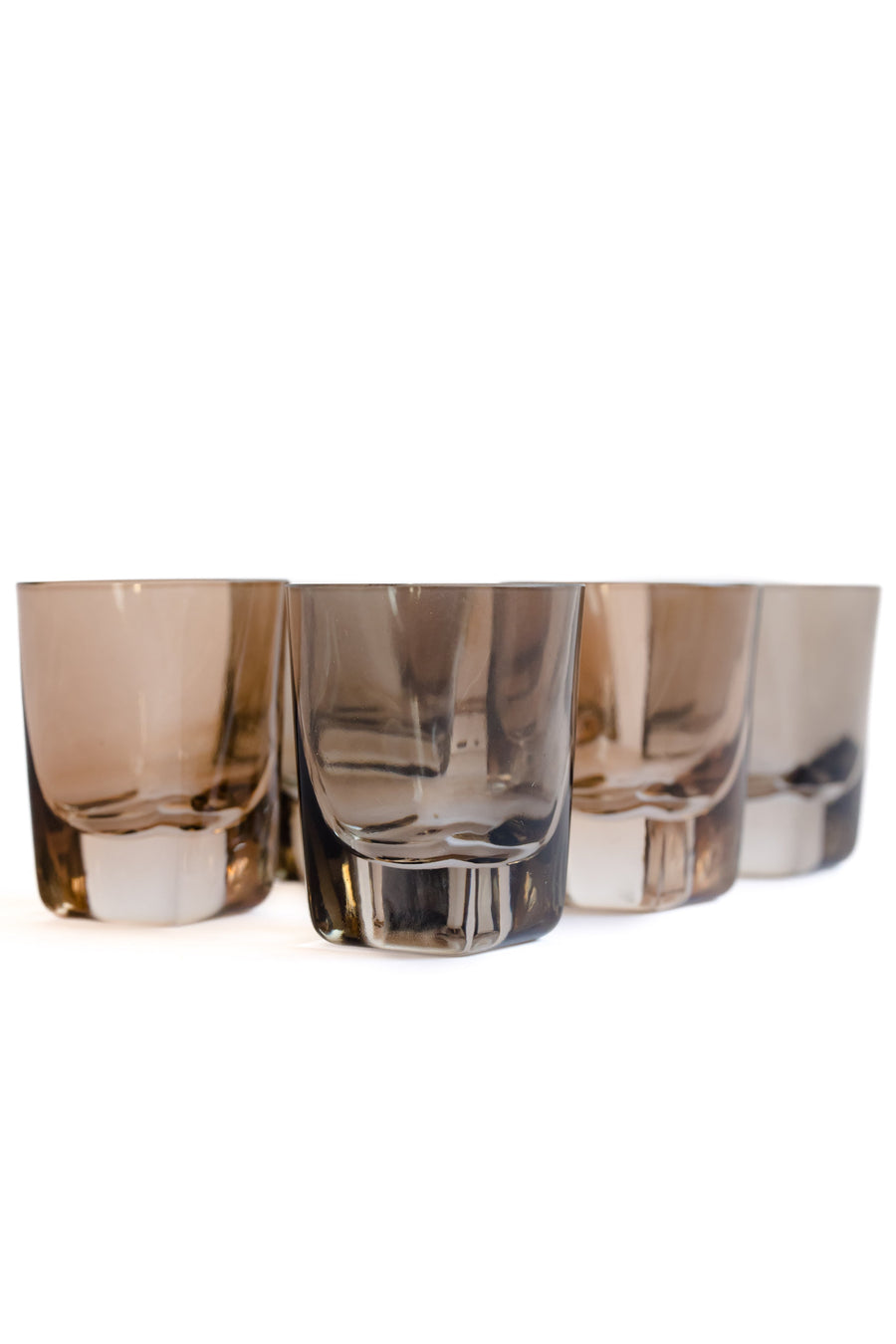 Colorful vibrant shot glasses arranged elegantly for an upscale dining experience.