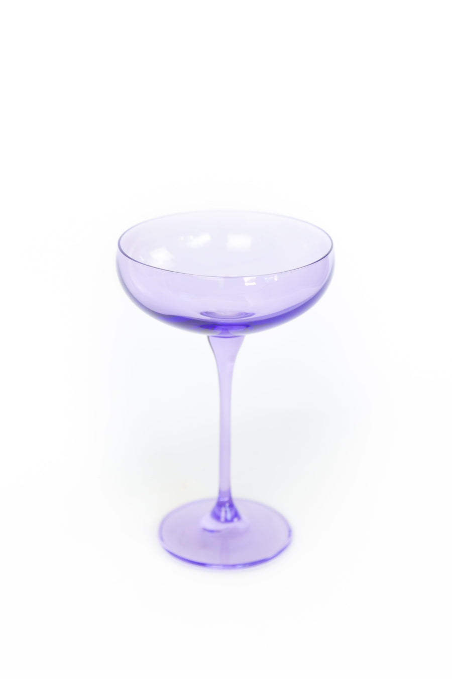 Lavender-themed setting with elegant champagne coupes, perfect for sophisticated celebrations and décor.