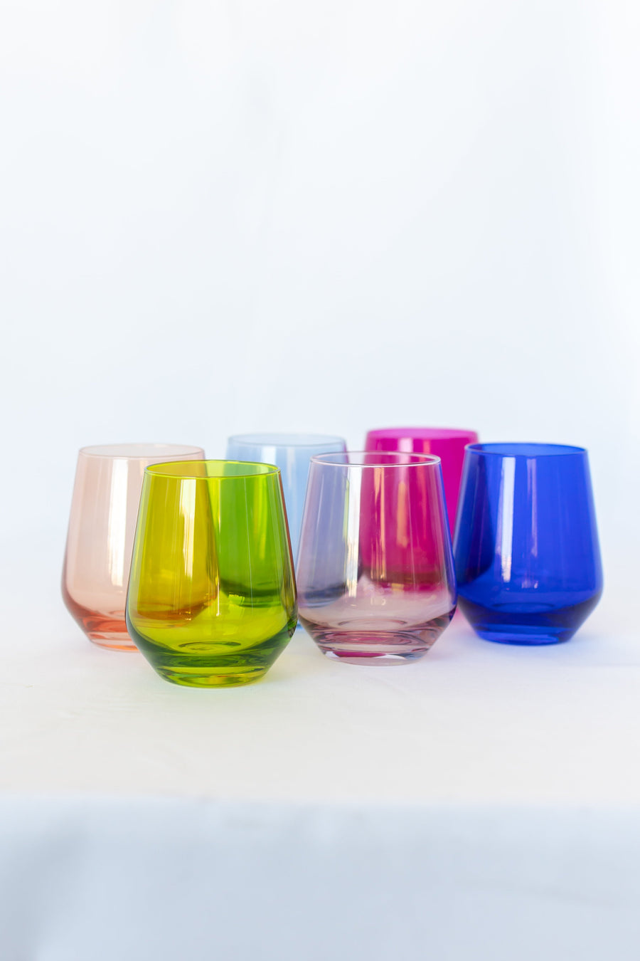 Vibrant red and white wine glasses set elegantly arranged for a formal dining setting