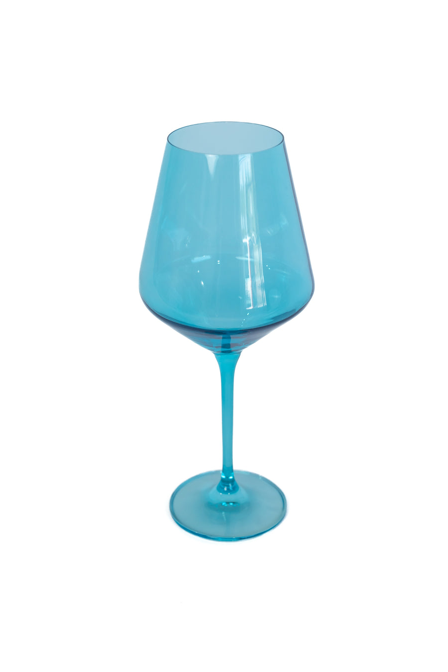 Elegant ocean blue wine glasses set on a pristine table, capturing the essence of luxury and coastal charm.