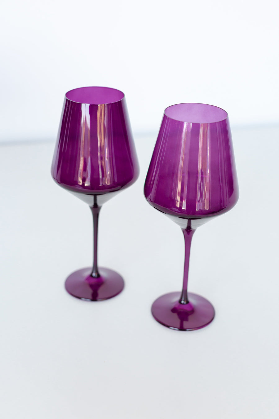 Elegant amethyst wine glass showcasing exquisite craftsmanship and rich purple hues perfect for sophisticated gatherings.