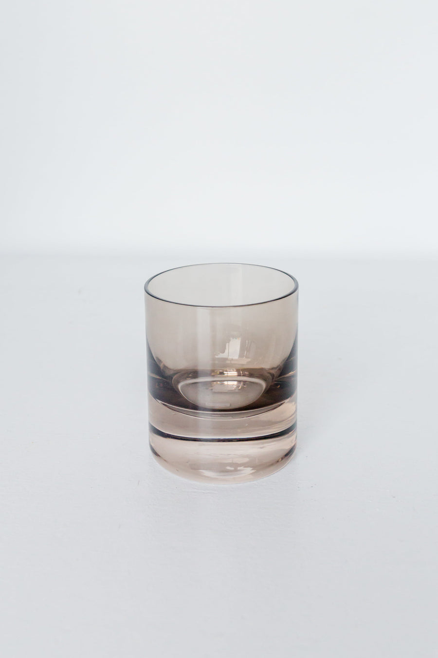 Elegant colored rocks glass in gray smoke, perfect for sophisticated cocktail presentations and stylish home bars.