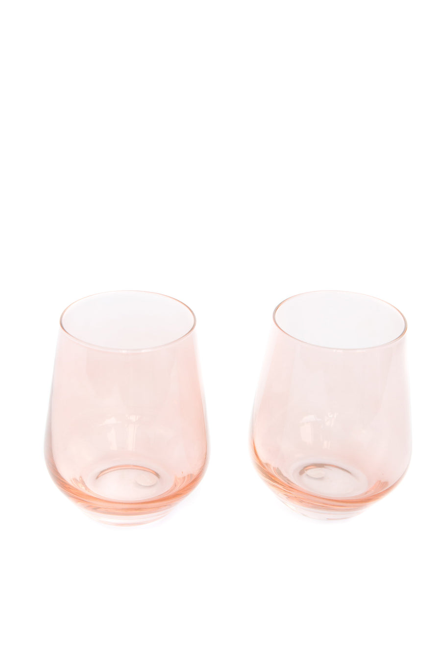 Elegant blush pink stemless wine glasses perfect for stylish entertaining and sophisticated table settings