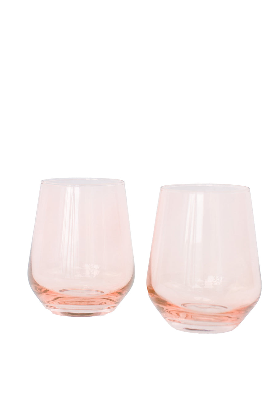 Elegant blush pink stemless wine glasses perfect for stylish entertaining and sophisticated table settings