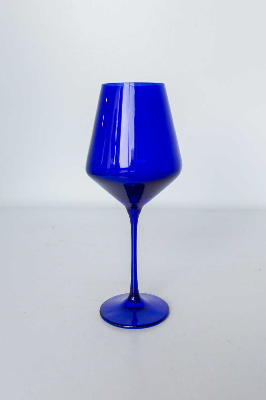 Elegant royal blue wine stemware set enhancing the dining experience with sophisticated style and vibrant color