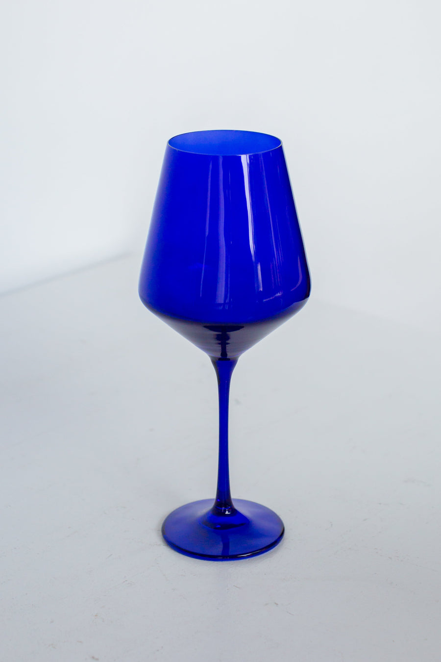 Elegant royal blue wine stemware set enhancing the dining experience with sophisticated style and vibrant color