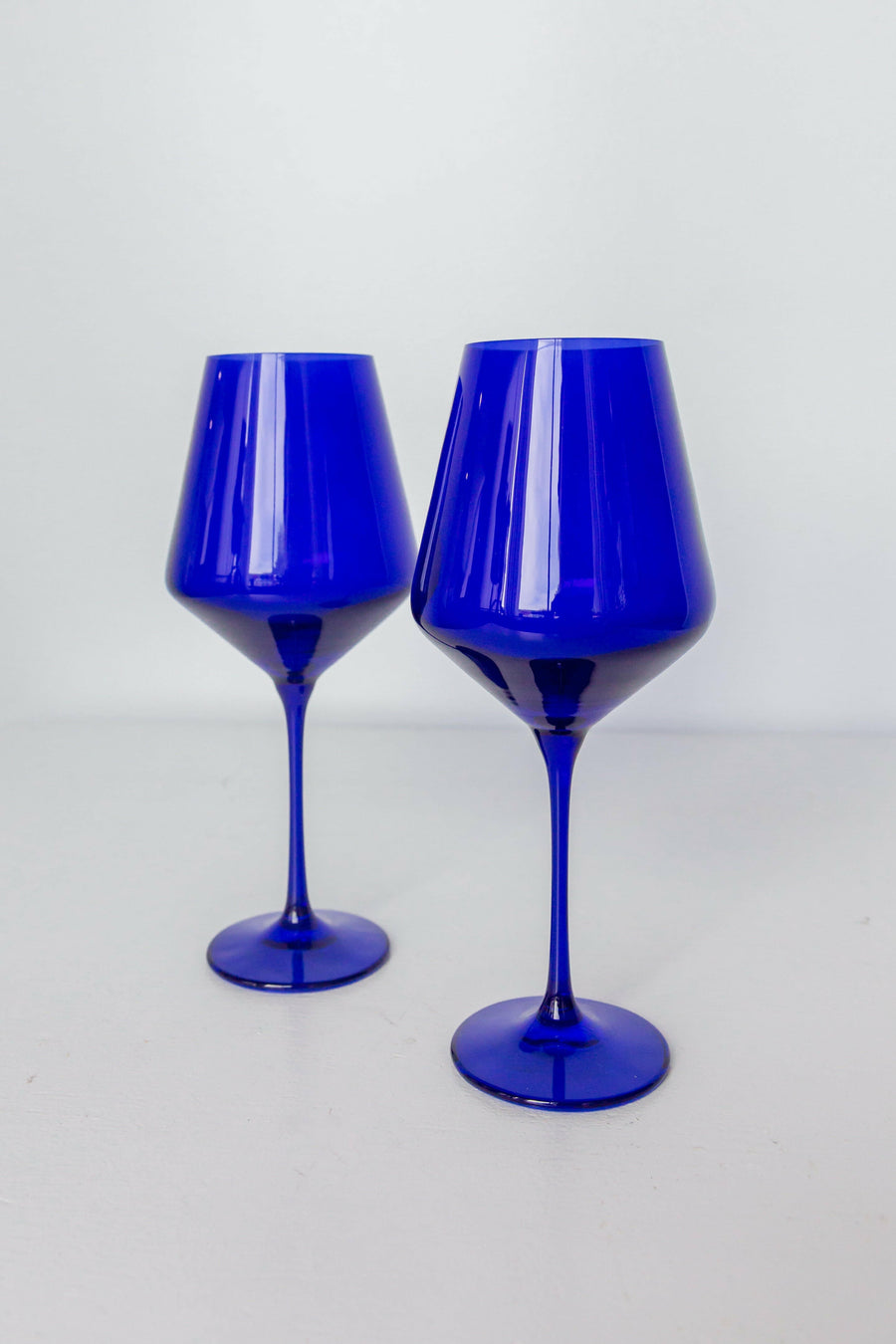Elegant royal blue wine stemware set enhancing the dining experience with sophisticated style and vibrant color